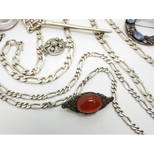 892 - A Bernard Instone style brooch, a Thomas Ebbutt, silver brooch, silver chains and other items