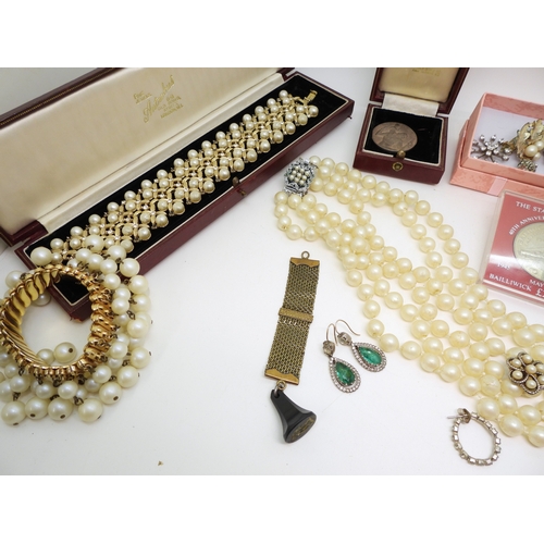 893 - A pair of yellow and white metal faux emerald earrings, faux pearls, two good jewellery boxes from A... 