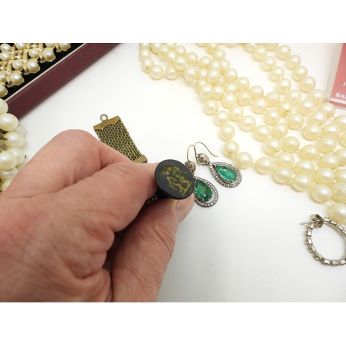 893 - A pair of yellow and white metal faux emerald earrings, faux pearls, two good jewellery boxes from A... 