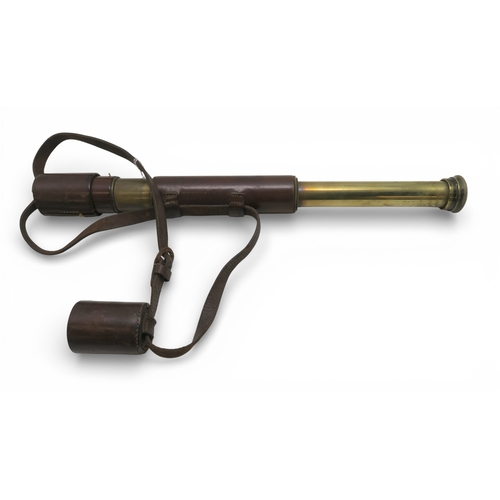 528 - A two-draw brass Comet&nbsp;telescope by Newbold & Bulford of London, retailed by Garat Optician... 