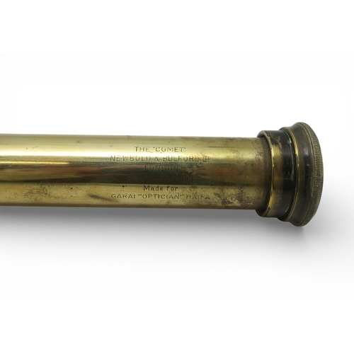528 - A two-draw brass Comet&nbsp;telescope by Newbold & Bulford of London, retailed by Garat Optician... 