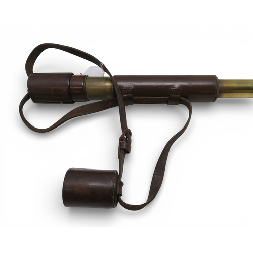 528 - A two-draw brass Comet&nbsp;telescope by Newbold & Bulford of London, retailed by Garat Optician... 