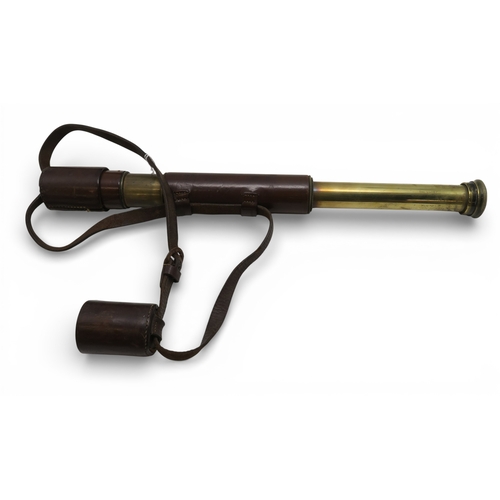 528 - A two-draw brass Comet&nbsp;telescope by Newbold & Bulford of London, retailed by Garat Optician... 