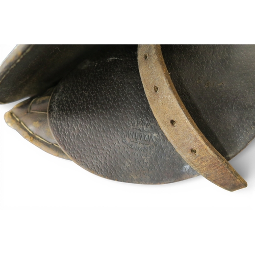 530 - A WW1-period British 1912-pattern cavalry saddle by Champion & Wilton of Oxford Street, London
