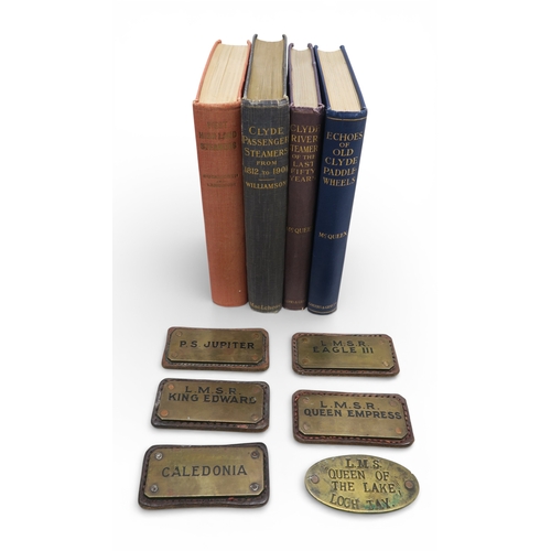 536 - A collection of early-20th century brass labels mounted on leather, believed originally to have been... 