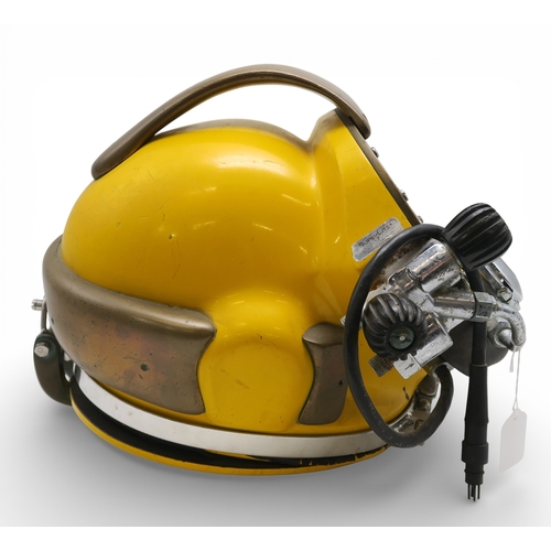 540 - A Kirby Morgan SuperLite 17 commercial diver's helmet, in yellow, fitted with a Super Flow regulator... 