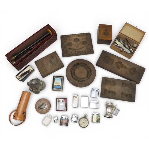 542 - *AMENDED* A boxed bagpipe chanter by R.G. Lawrie of Glasgow; four various carved wood gingerbread mo... 