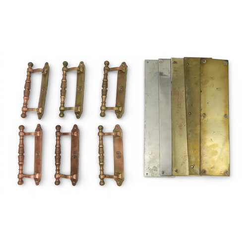 543 - A set of six copper and brass sash window pulls or cupboard handles, together with five brass finger... 