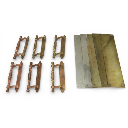 543 - A set of six copper and brass sash window pulls or cupboard handles, together with five brass finger... 