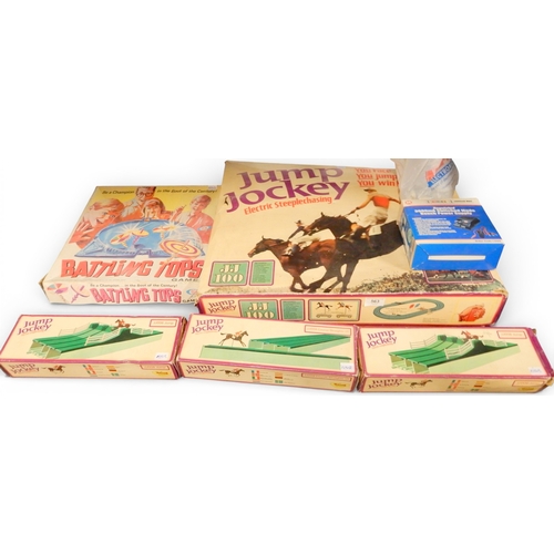 563 - Jump Jockey Electric Steeple Chase JJ100 with three additional course sections together with a Battl... 