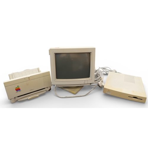 566 - APPLE PERFORMA 460To include Apple Performa Plus display monitor, Apple Desktop Bus Mouse II, Apple ... 