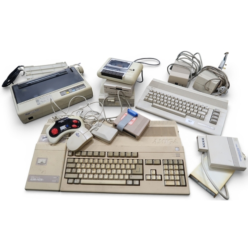 567 - COMMODORE 64 AND AMIGA A500-HD8+ To include Commodore 158L floppy disk drive and 1541-II floppy disk... 