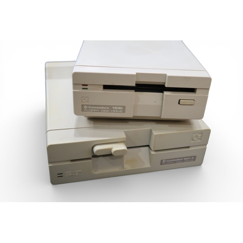 567 - COMMODORE 64 AND AMIGA A500-HD8+ To include Commodore 158L floppy disk drive and 1541-II floppy disk... 