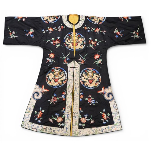 A CHINESE HAN STYLE LADIES SILK EMBROIDERED ROBEthe black ground ...