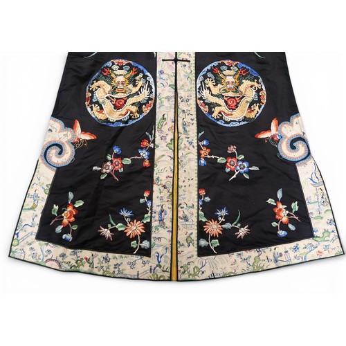 A CHINESE HAN STYLE LADIES SILK EMBROIDERED ROBEthe black ground ...