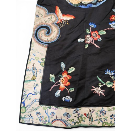 A CHINESE HAN STYLE LADIES SILK EMBROIDERED ROBEthe black ground ...