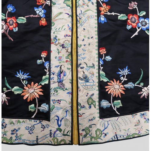 A CHINESE HAN STYLE LADIES SILK EMBROIDERED ROBEthe black ground ...