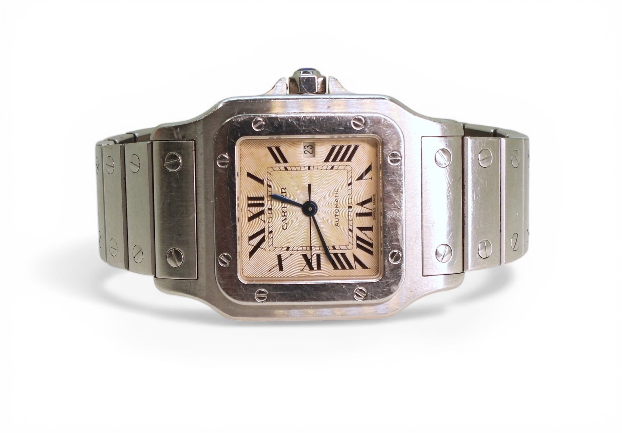 A CARTIER AUTOMATIC SANTOSmade in stainless steel with an engraved wave ...