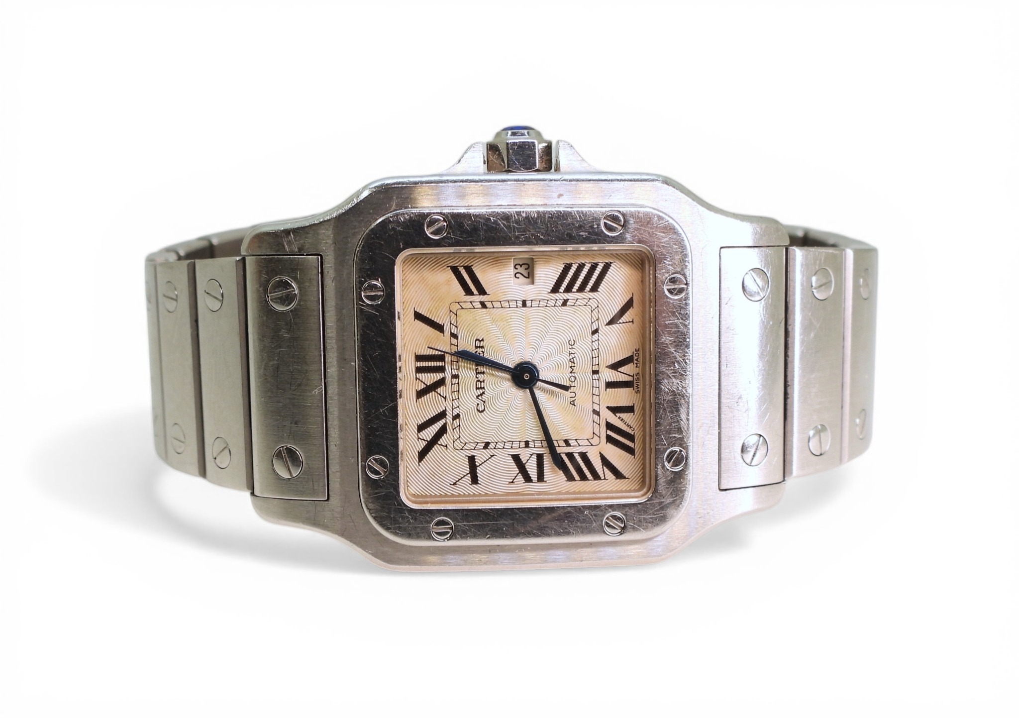 A CARTIER AUTOMATIC SANTOSmade in stainless steel with an engraved wave ...