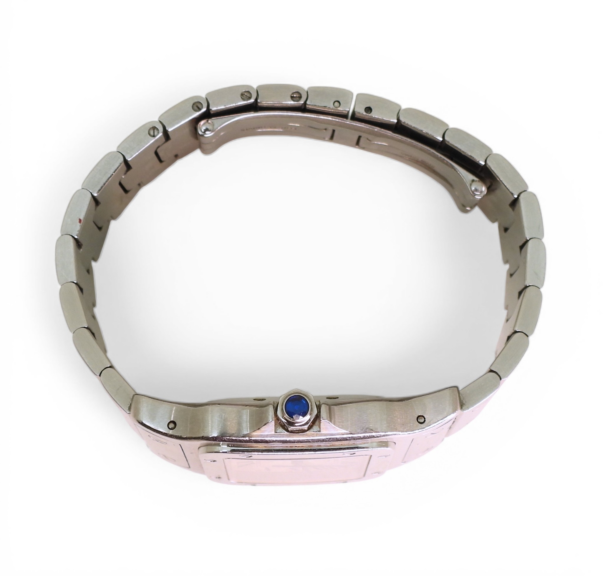 A CARTIER AUTOMATIC SANTOSmade in stainless steel with an engraved wave ...