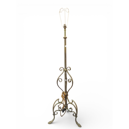 41 - A lot comprising an early 20th century brass standard lamp with scrolled tripod base, 145cm high (wi... 