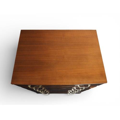 46 - A mid 20th century teak lacquer veneered three piece bedroom suite consisting chest of six drawers o... 