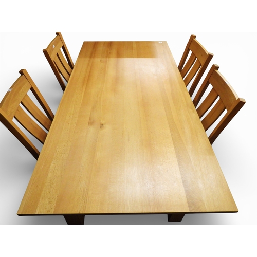 58 - A contemporary blonde oak dining suite consisting dining table with square supports, 76cm high x 180... 