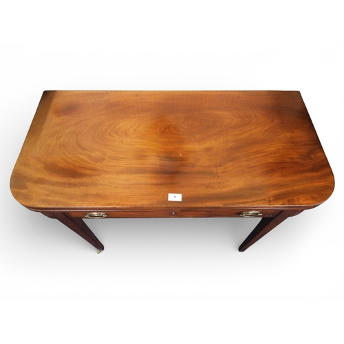 9 - A 19th century mahogany fold over tea table with single frieze drawer on square tapering supports, 7... 