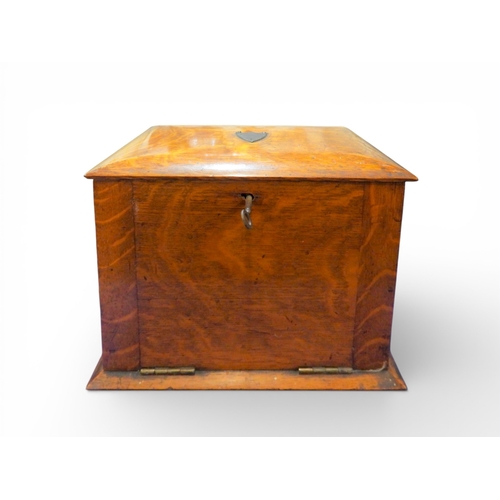 A Wooden stationary box, with key