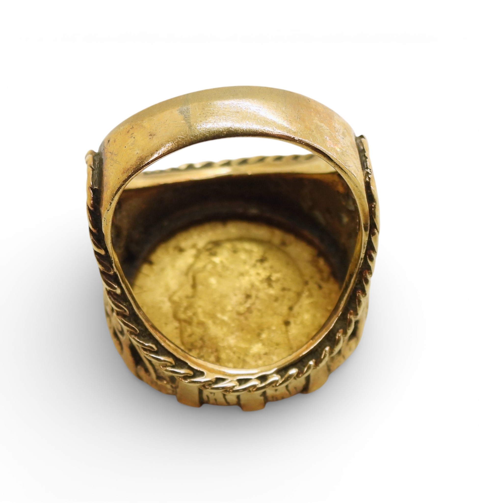 A 1913 gold half sovereign in a 9ct ring mount, size Q1/2, weight 12.2gms
