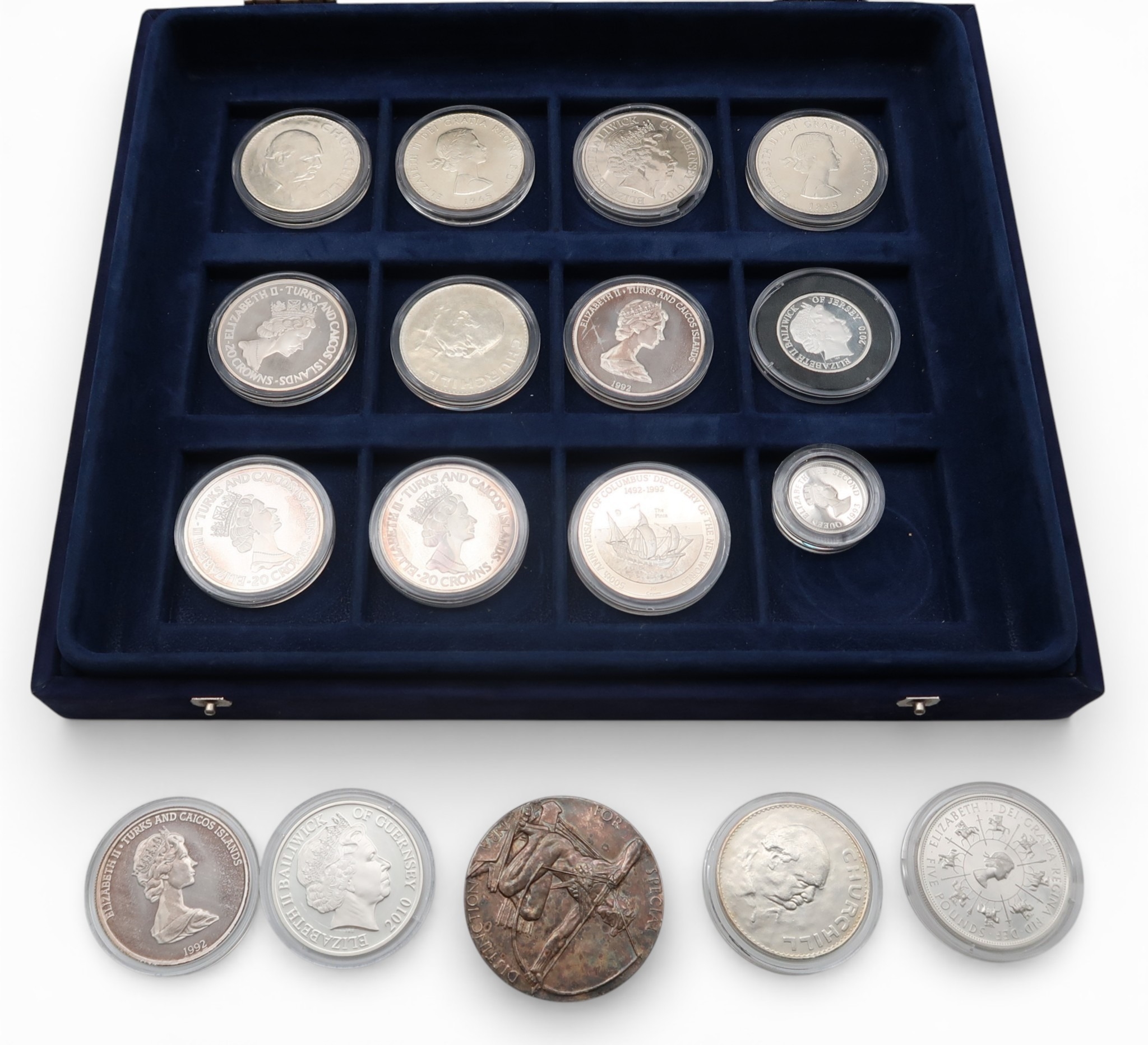 A lot comprising various commemorative coins to include silver examples ...