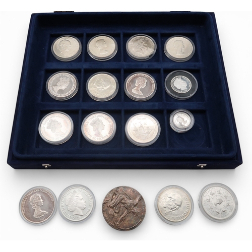 A lot comprising various commemorative coins to include silver examples ...