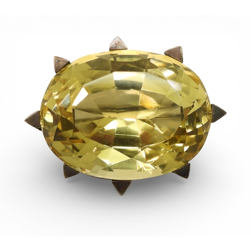 743 - A Victorian citrine brooch with a white metal star mount, and set with a 35mm 27mm x 21mm specimen c...