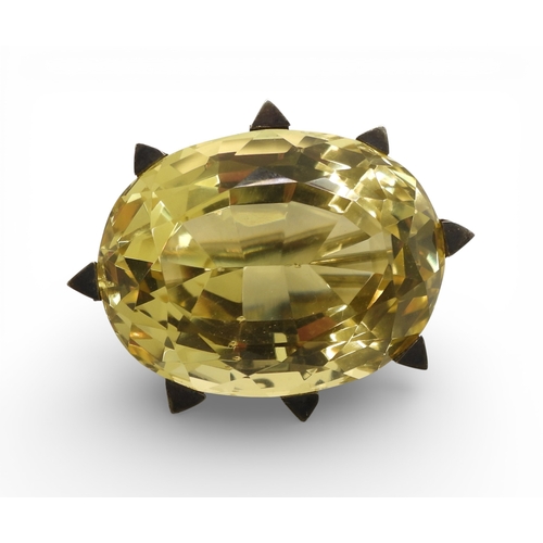 743 - A Victorian citrine brooch with a white metal star mount, and set with a 35mm 27mm x 21mm specimen c...