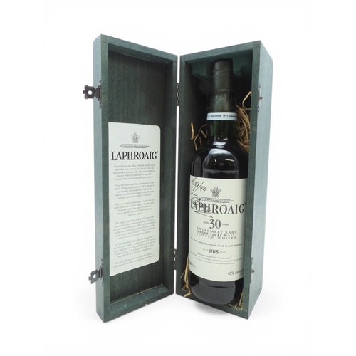 9000 - LAPHROAIG - 30 Year Old Islay Single Malt in presentation box. Bottle bearing a signature dated 18/0... 