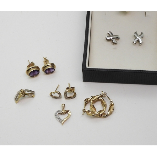 705 - A pair of 18ct white gold cross earrings weight 1.3gms, together with a pair of 9ct gold heart shape...