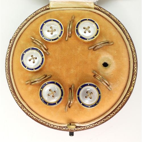 706 - A boxed set of five enamel and mother of pearl buttons (one missing) stamped 18ct to the edge, weigh...