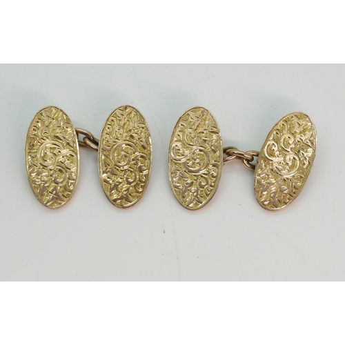 708 - A pair of rose gold floral engraved cufflinks, hallmarked  Birmingham 1908, weight 6gms...