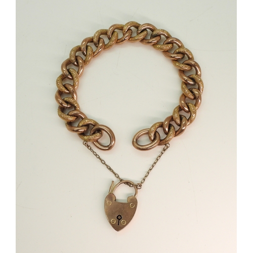 711 - A 9ct rose gold curb chain bracelet, stamped 9c to every link length 18cm, weight 23.3gms...