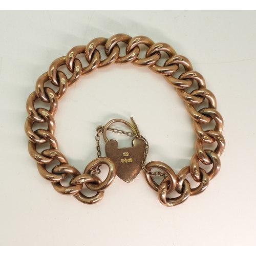 711 - A 9ct rose gold curb chain bracelet, stamped 9c to every link length 18cm, weight 23.3gms...
