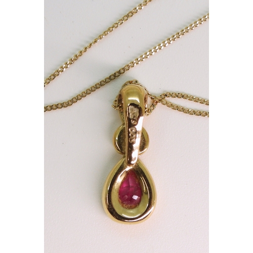 712 - A 9ct ruby and diamond pendant on a 52cm chain, weight 1.9gms...