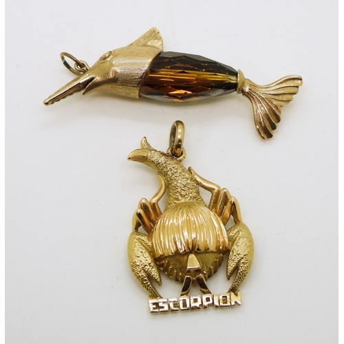 713 - A 9ct gold large swordfish pendant, length 5cm, weight 6.6gms, together with a yellow metal Scorpio ...