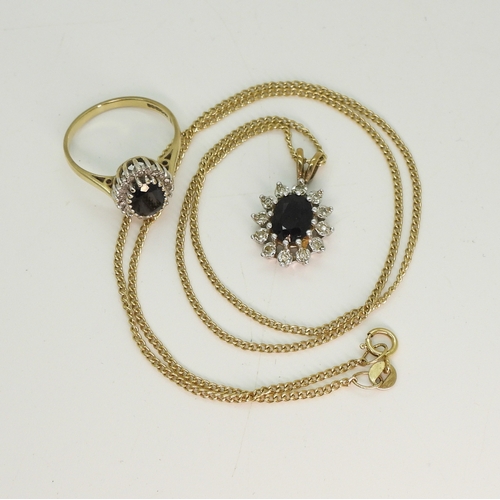 725 - A 9ct sapphire and diamond accent pendant and chain, length of chain 45cm, with matching ring, size ...
