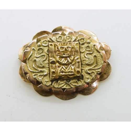 727 - An 18ct gold Aztec design brooch, weight 5.2gms...