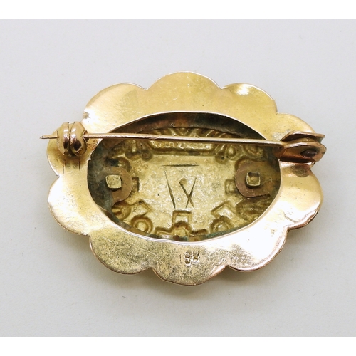 727 - An 18ct gold Aztec design brooch, weight 5.2gms...