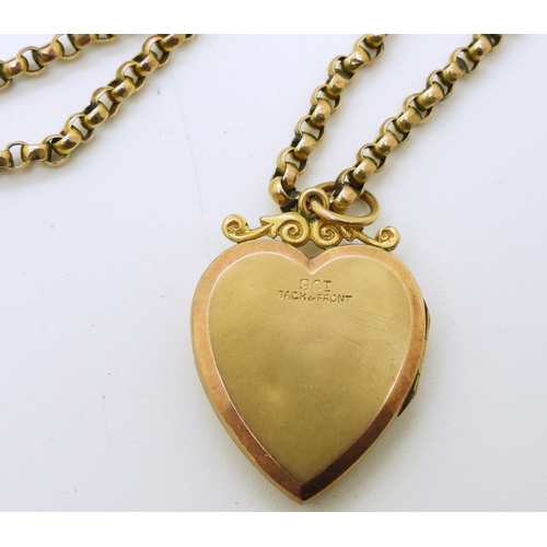 731 - A 9ct gold back & front heart shaped locket set with a rose cut diamond, on a 9ct gold vintage b...