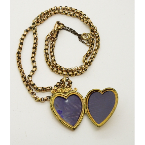 731 - A 9ct gold back & front heart shaped locket set with a rose cut diamond, on a 9ct gold vintage b...