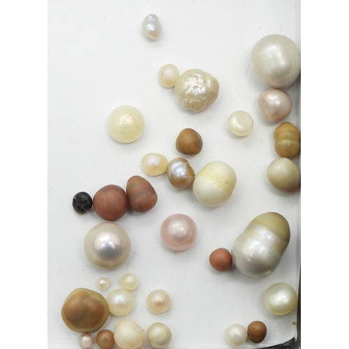 734 - Approximately thirty Scottish river pearls, largest 9mm to smallest 1mm, A mixed collection of examp...