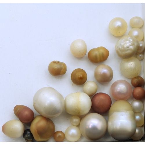 734 - Approximately thirty Scottish river pearls, largest 9mm to smallest 1mm, A mixed collection of examp...