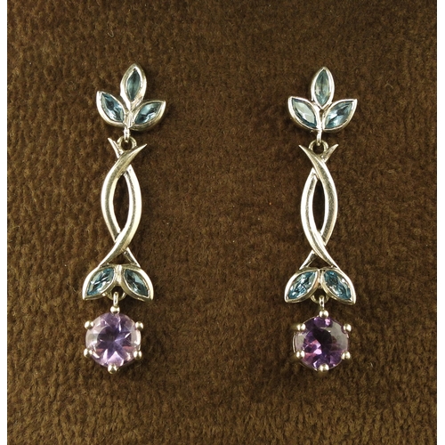742 - A pair of 9ct white gold amethyst and blue topaz drop earrings, length 3.5cm, weight 4.1gms...